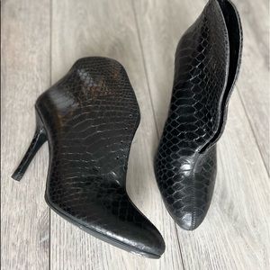 Vince Camuto snake patterned heeled boots  size 7.5